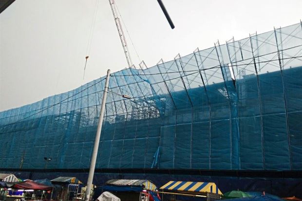 Utilisation du filet de sécurité de la construction